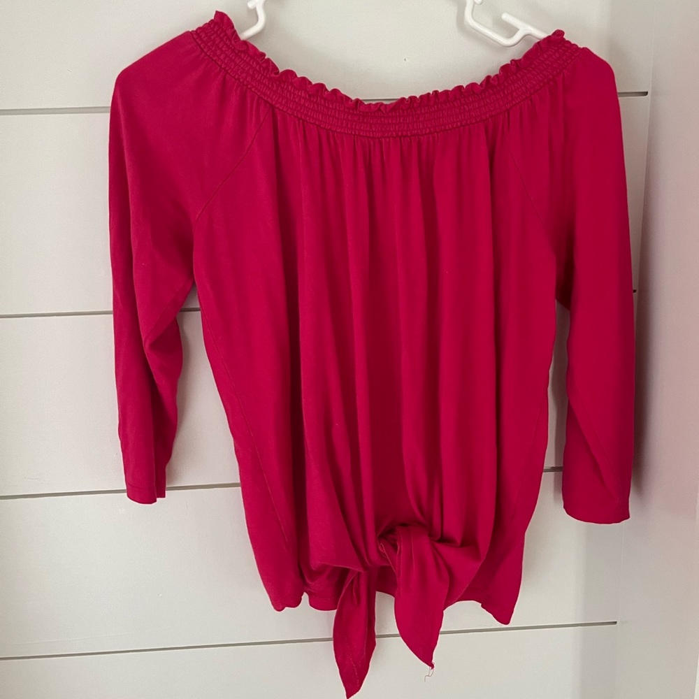 Pink tie shirt with slits in sleeves